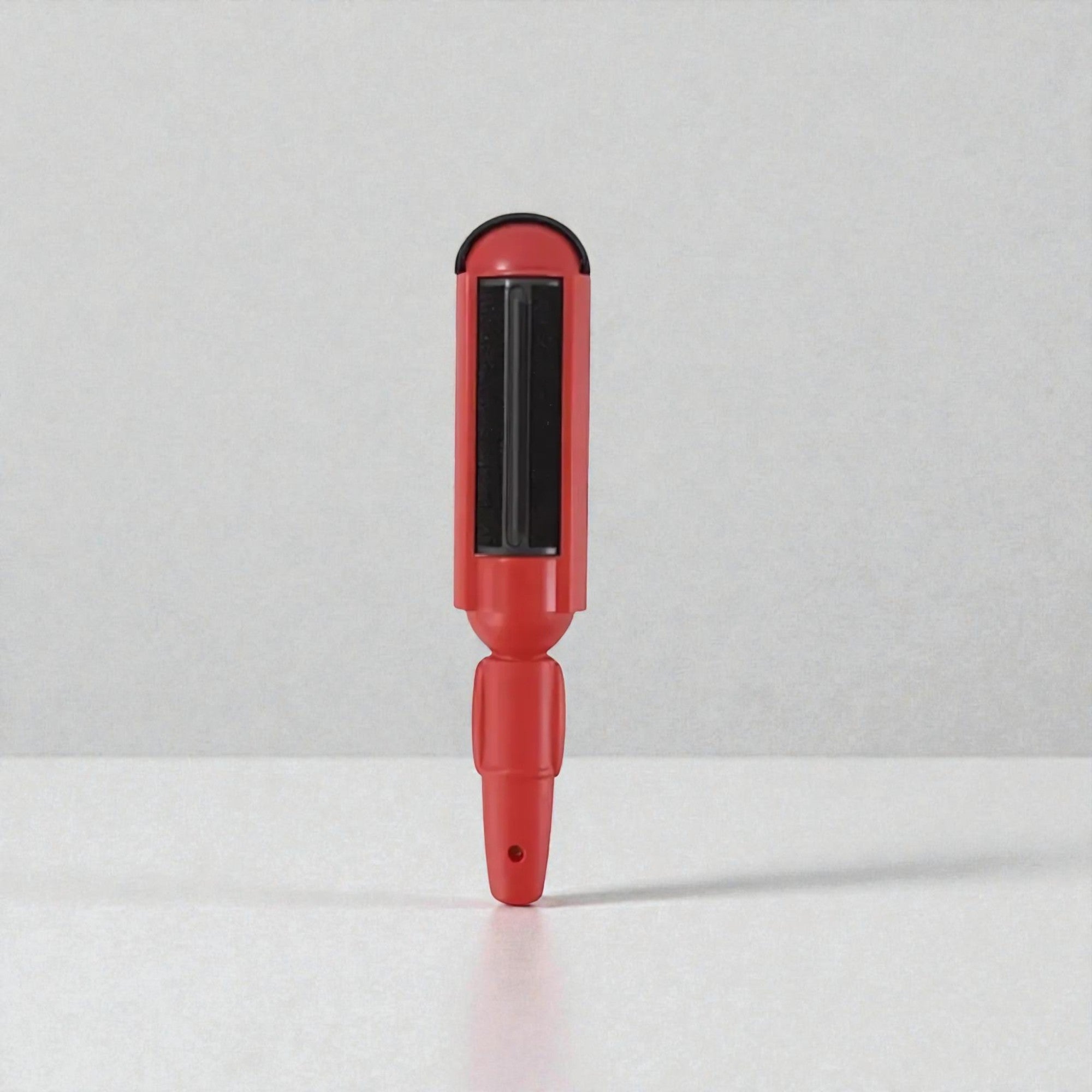 Rouleau anti-poils avec réservoir transparent vue profil collecte visible
